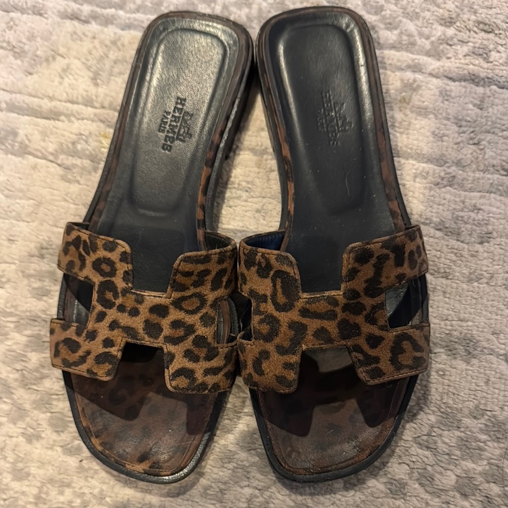 Leopard Hermes sandals.
